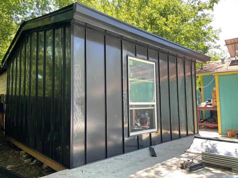 Black standing seam metal wall panels for Roof Inspection in La Verne