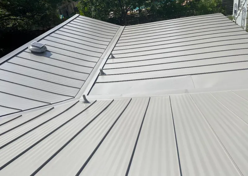 Solar attic fan installed on a metal roof for Roof Ventilation in La Verne